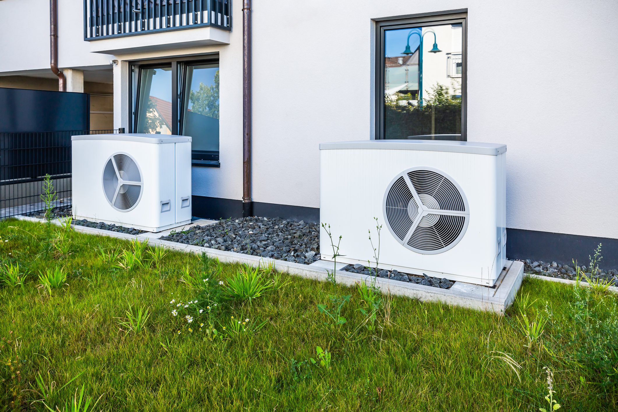 Outdoor air conditioning units on grass